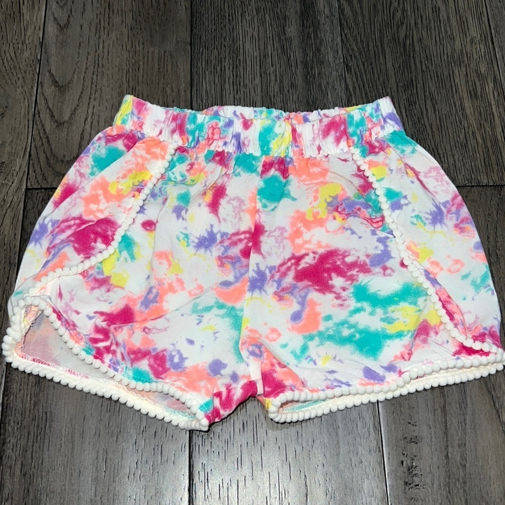 Girls tie dye like shorts with Pom Pom like hem